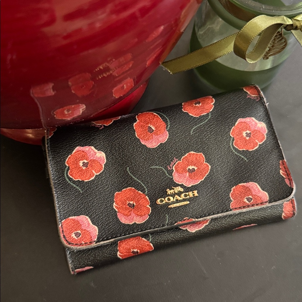 COACH bifold wallet with cute poppy print. Change pocket in back. Snap closure. - Picture 5 of 16